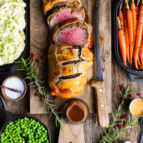 beef wellington on cutting board
