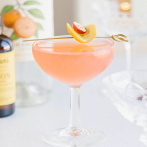 coupe glass with pink cocktail