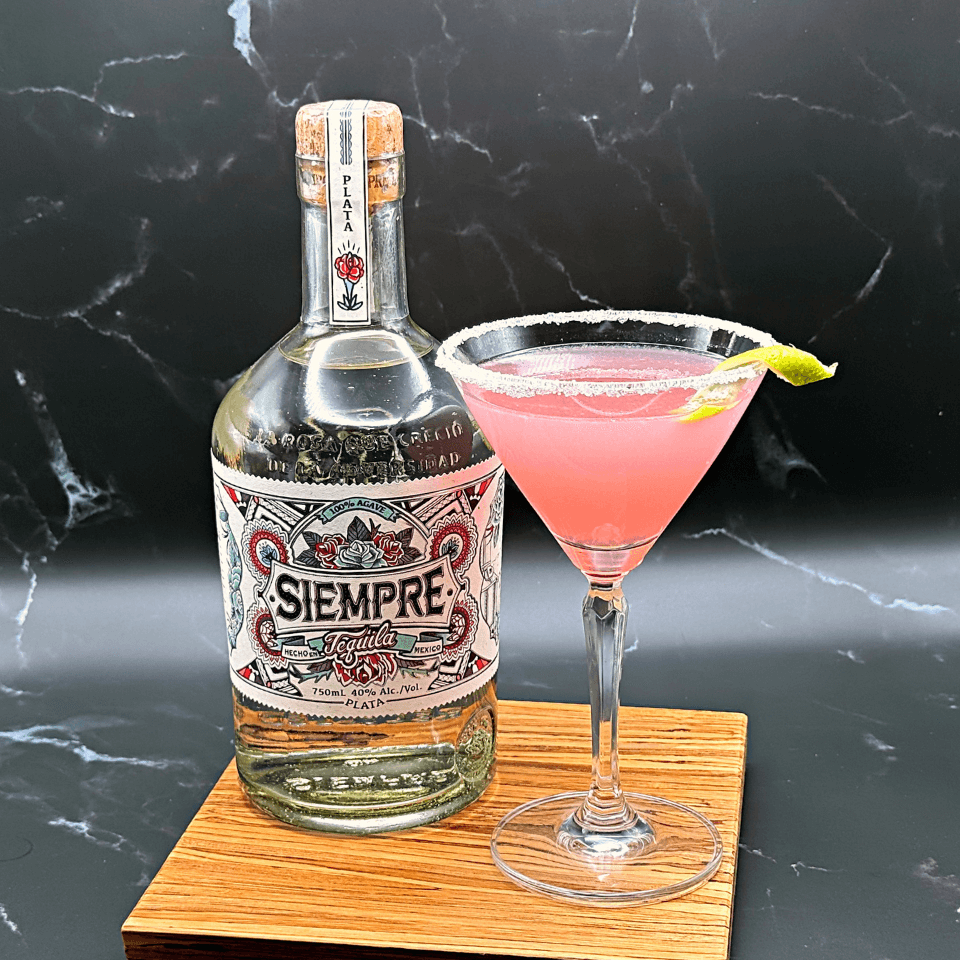 Bottle of Siempre Tequila Plata and a Cosmo Rita Cocktail