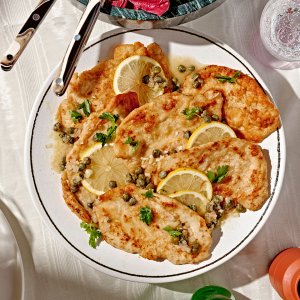 A plate with chicken piccata