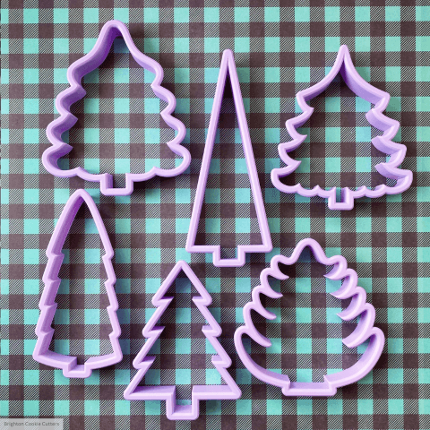 Cookie cutters on gingham background
