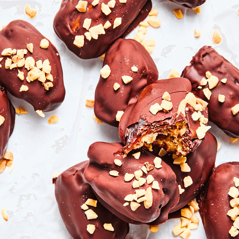 chocolate covered dates in a pile