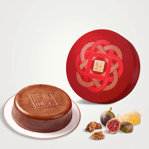 A delicious lunar new year pudding with beautiful red box cover