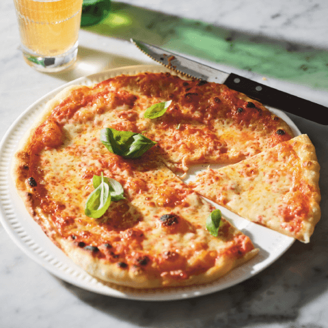 pizza with tomato sauce and cheese