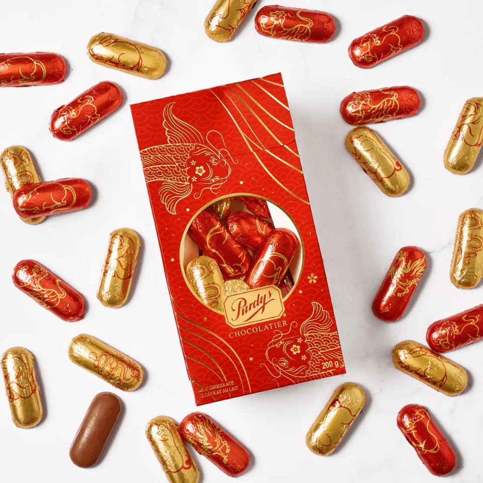 box of canadian chocolates with red and gold