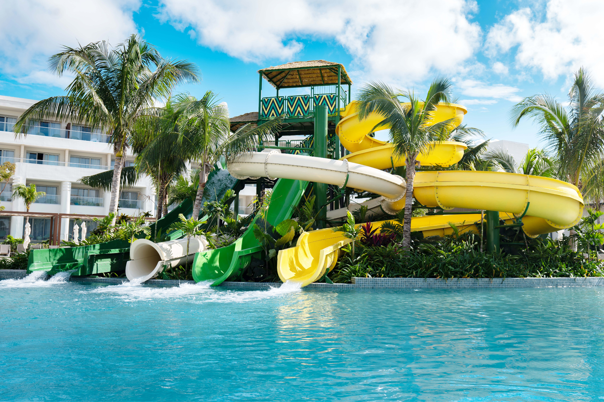 Princes Grand Jamaica Waterpark, with yellow and green waterslides 