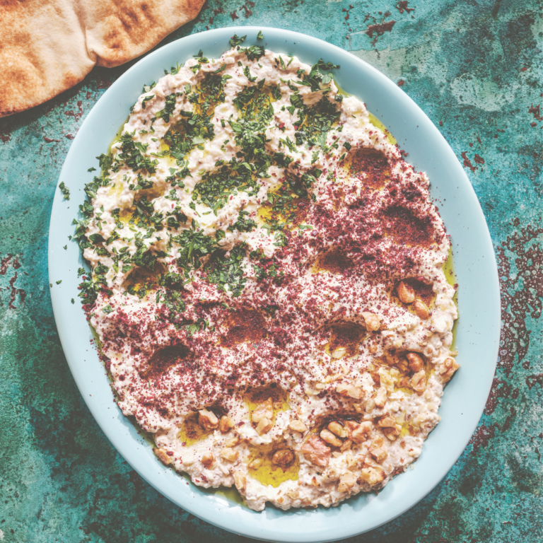 Eggplant and yogurt meze dip topped with sumac, olive oil, pine nuts and herbs. Served with pita bread.