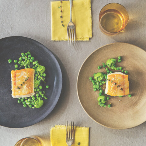 Pan seared halibut fillets with spring peas and a spinach-pea purée