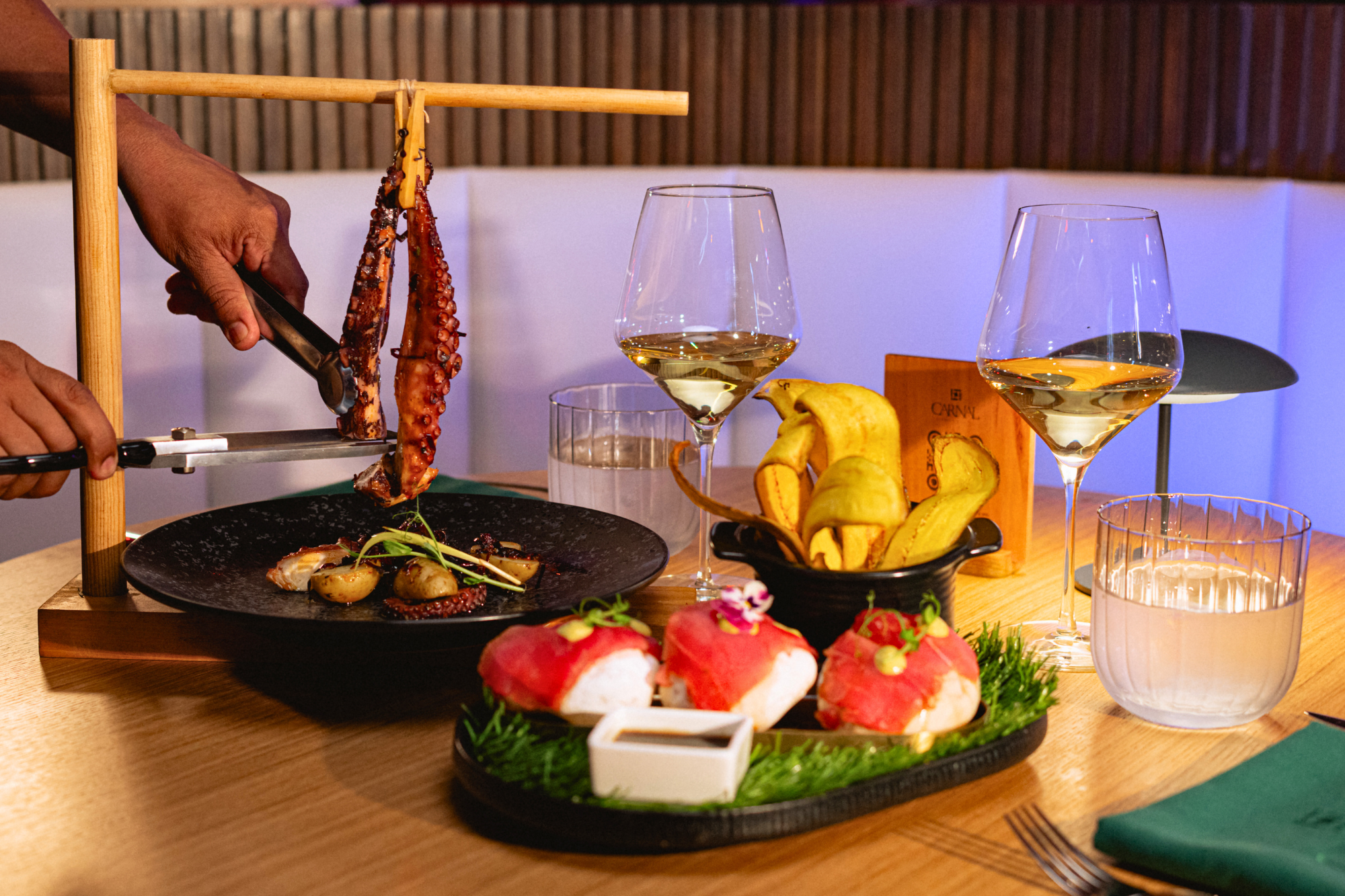 GRILLED OCTOPUS WITH HUACATAY SAUCE Grilled octopus with a Huacatay (Andean herb) sauce