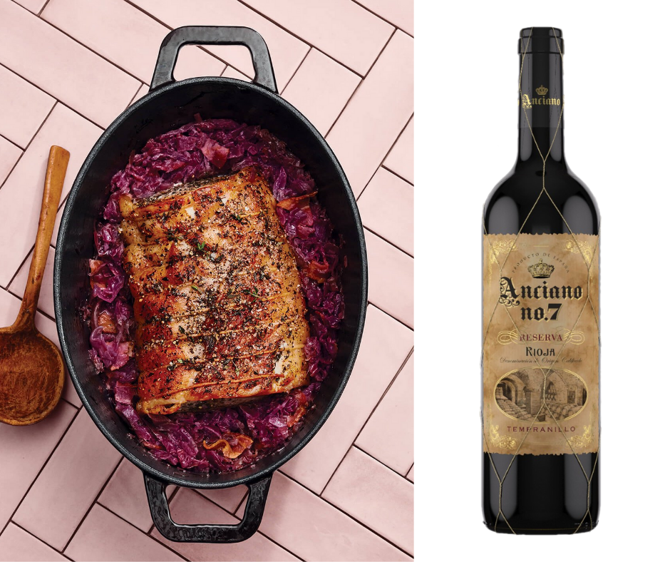 Smoky pork loin sitting on braised cabbage with a wine pairing