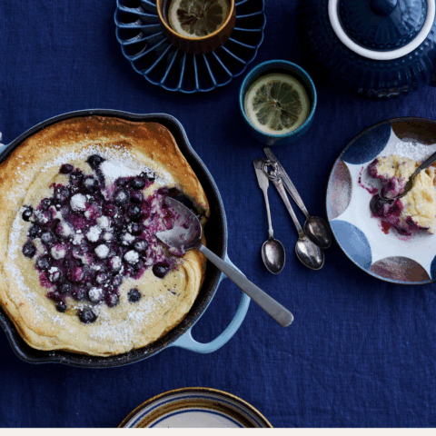 Blueberry ricotta pancake in a cast iron skillet