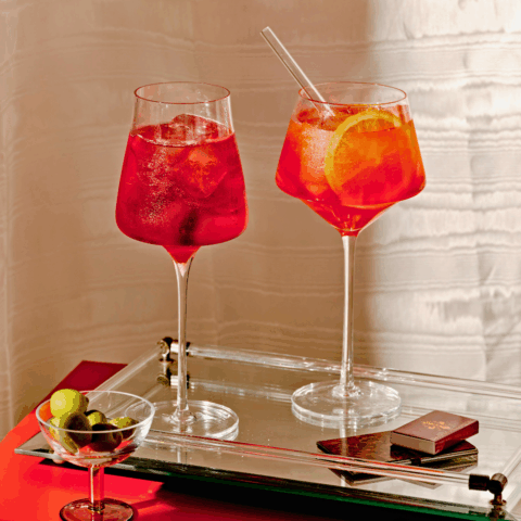 Two glasses of spritzes, including a venetian spritz and an aperol spritz