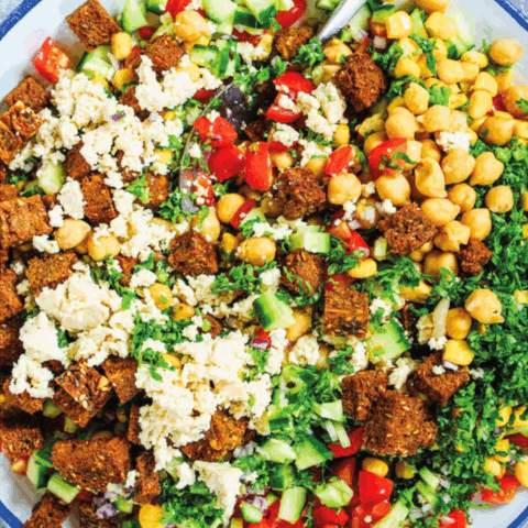 Image of Jerusalem salad recipe made with tofu and chickpeas.