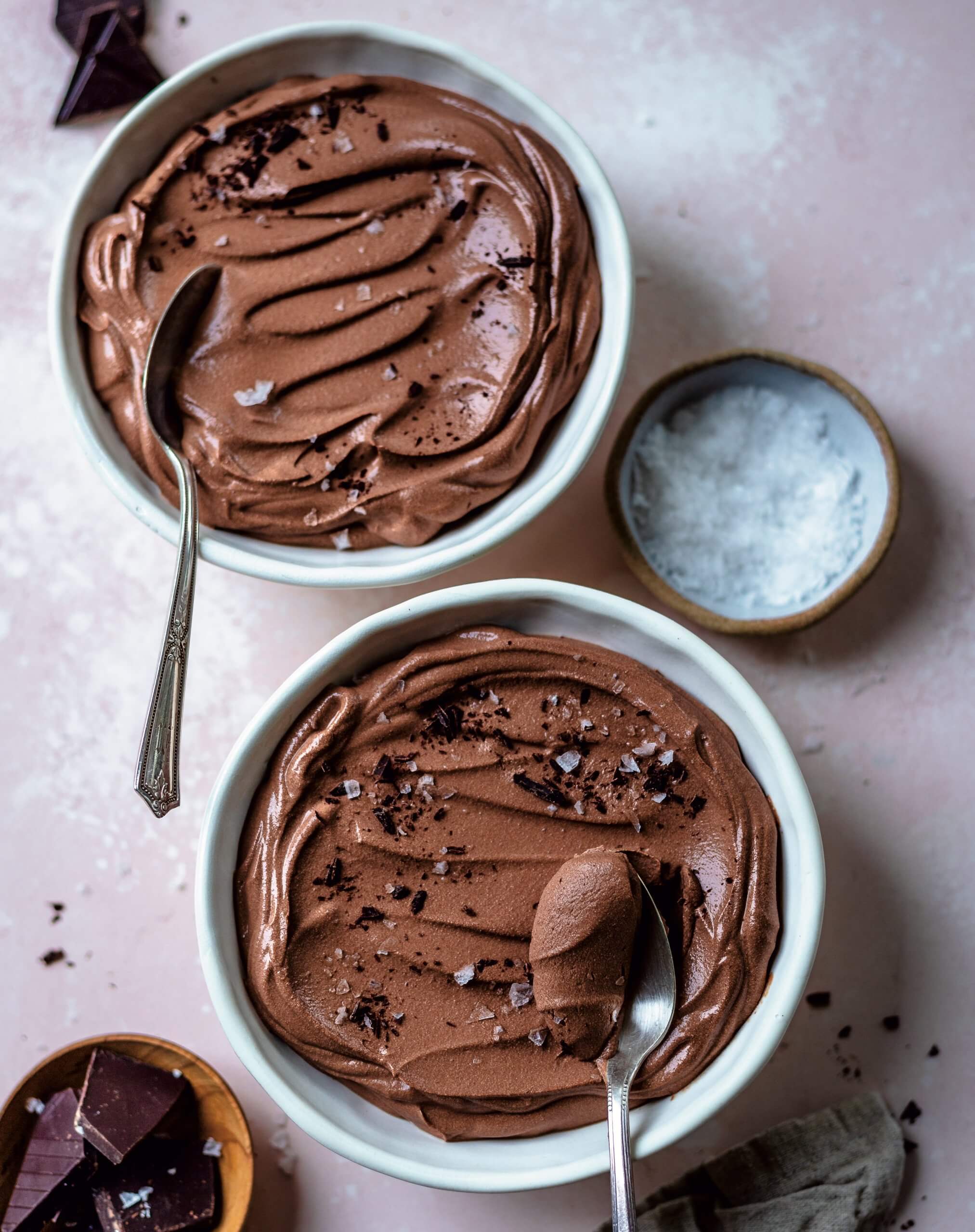 Two bowls of chocolate mousee.