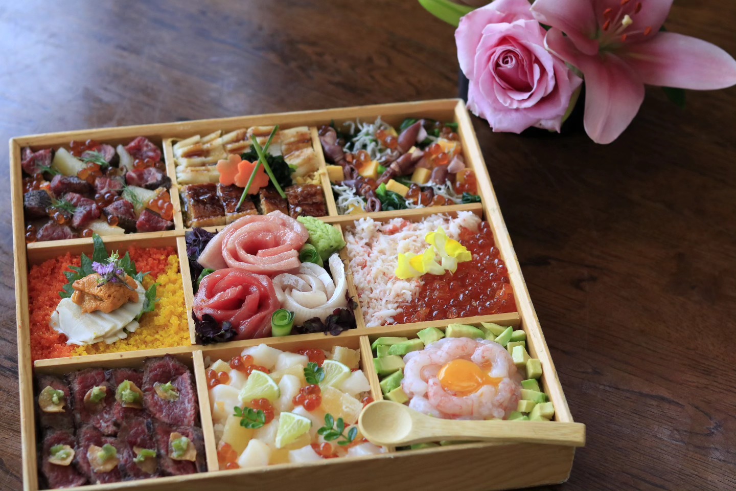 Wooden box separated into a grid of nine squares, filled with seafood.  