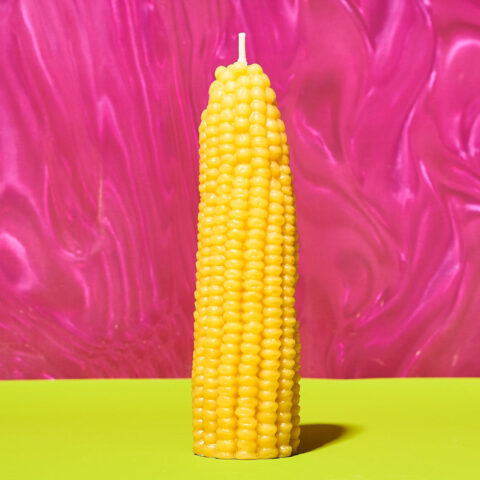 a candle that looks identical to a piece of corn