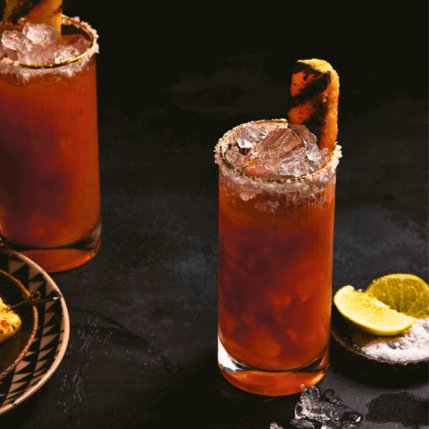 Oaxaca Caesar Cocktail with Grilled Pineapple Skewer