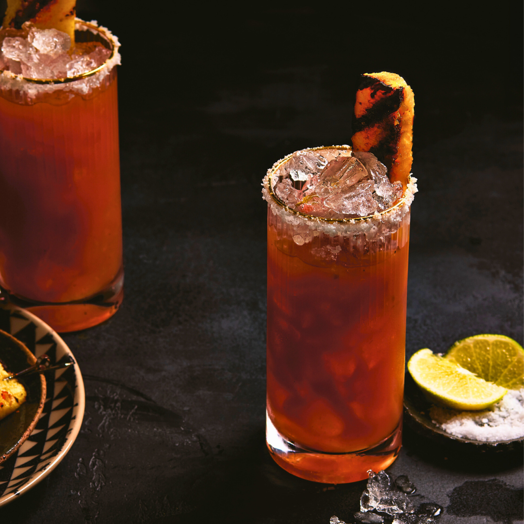 Oaxaca Caesar Cocktail with Grilled Pineapple Skewer