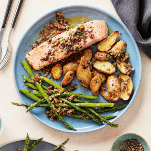A healthy dinner recipe which includes salmon, asparagus and roasted potatoes