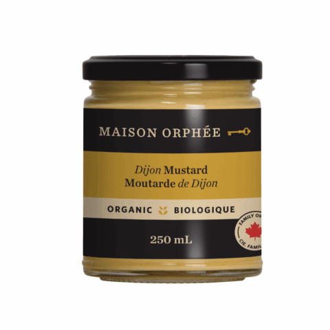 A clear jar of Maison Orphee dijon mustard.