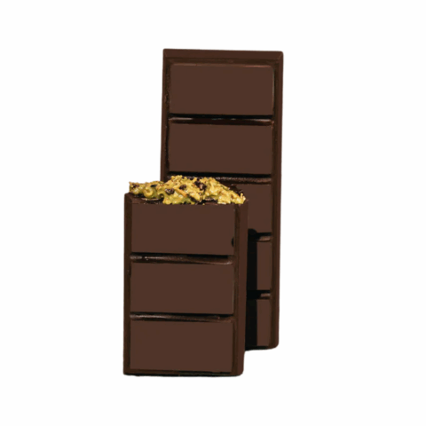 A dark chocolate bar with pistachio knafeh filling inside.