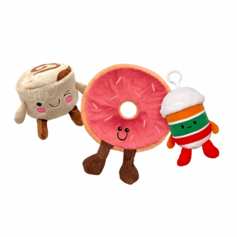 Three plushies shaped like a latte, pink doughnut and 7-Eleven cup.