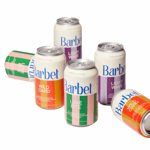 Six cans of sparkling water with a multi-coloured vertical striped design.