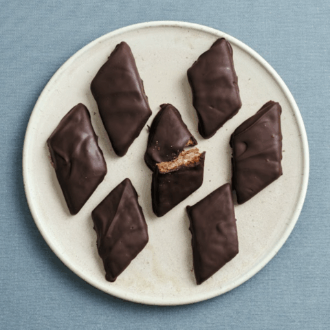 Mostaccioli Napoletani Italian Christmas cookies chocolate gingerbread style cookies on a plate