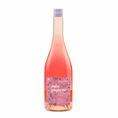 A pink bottle of wine spritzer with a white lid and pink label.