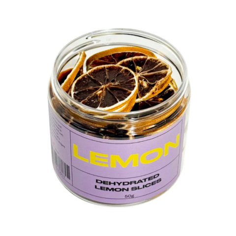 Clear jar filled with dehydrated lemon wheels and a light purple label.