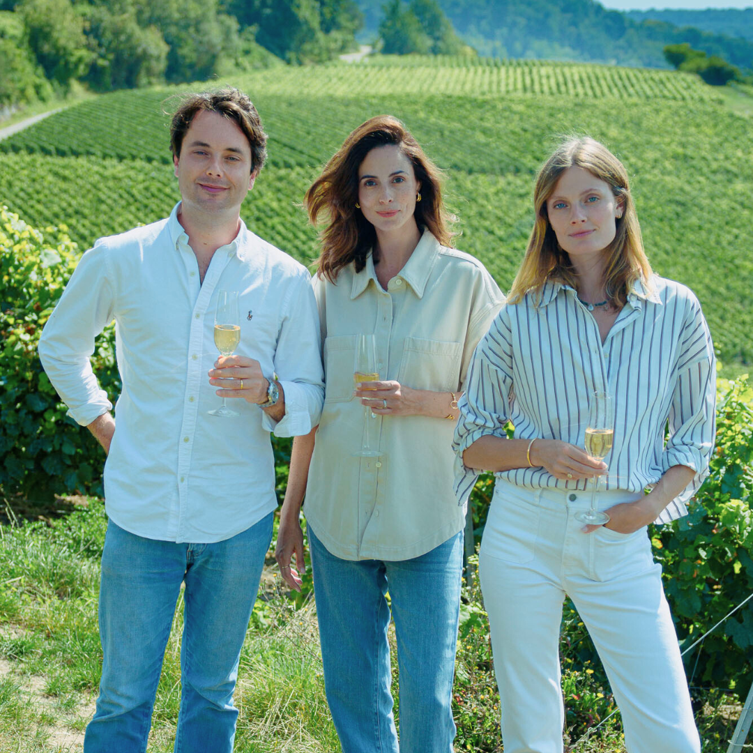 Rodolphe Frerejean-Taittinger, Maggie Frerejean-Taittinger and Constance Jablonski, founders of French Bloom standing in vineyard