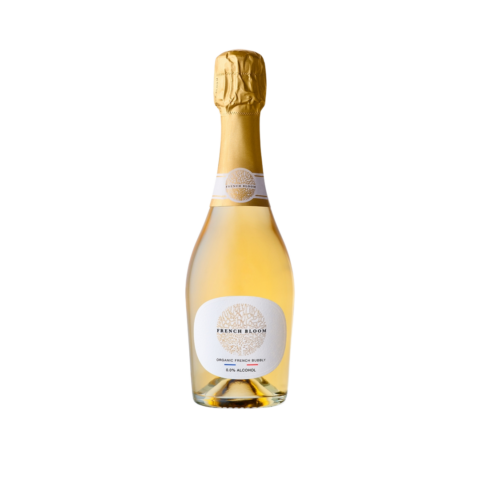 Clear bottle of light yellow non-alcoholic white wine with a gold foil seal.
