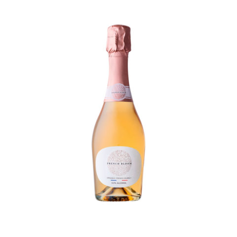 Clear bottle of light orange non-alcoholic rose with a pink foil seal.