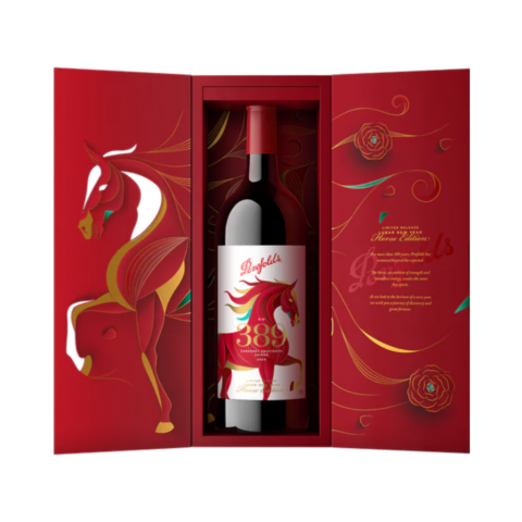 A red box opened to show a black bottle of wine with a white label picturing a red horse.