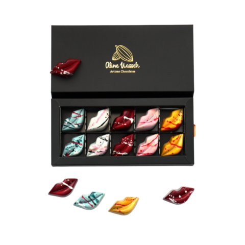 Black box opened to show ten hand-painted lips-shaped bonbons.