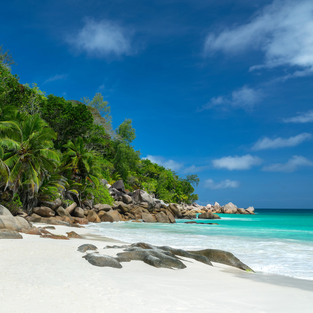 Carana Beach, Mahé, the Seychelles on a gorgeous day with aqua sea