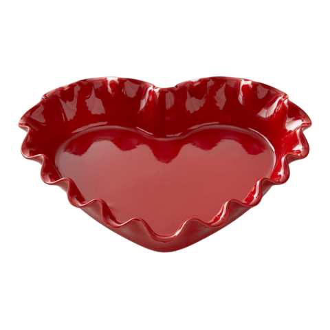 A red heart-shaped ceramic pie dish with a ruffled edge.