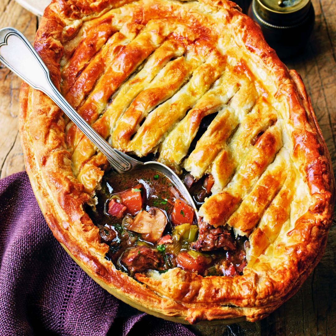 Steak and Guinness Pie with golden puff pastry