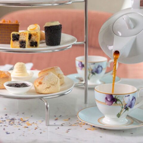 hot tea poured into a tea cup at afternoon tea at the Anantara Marker in Dublin