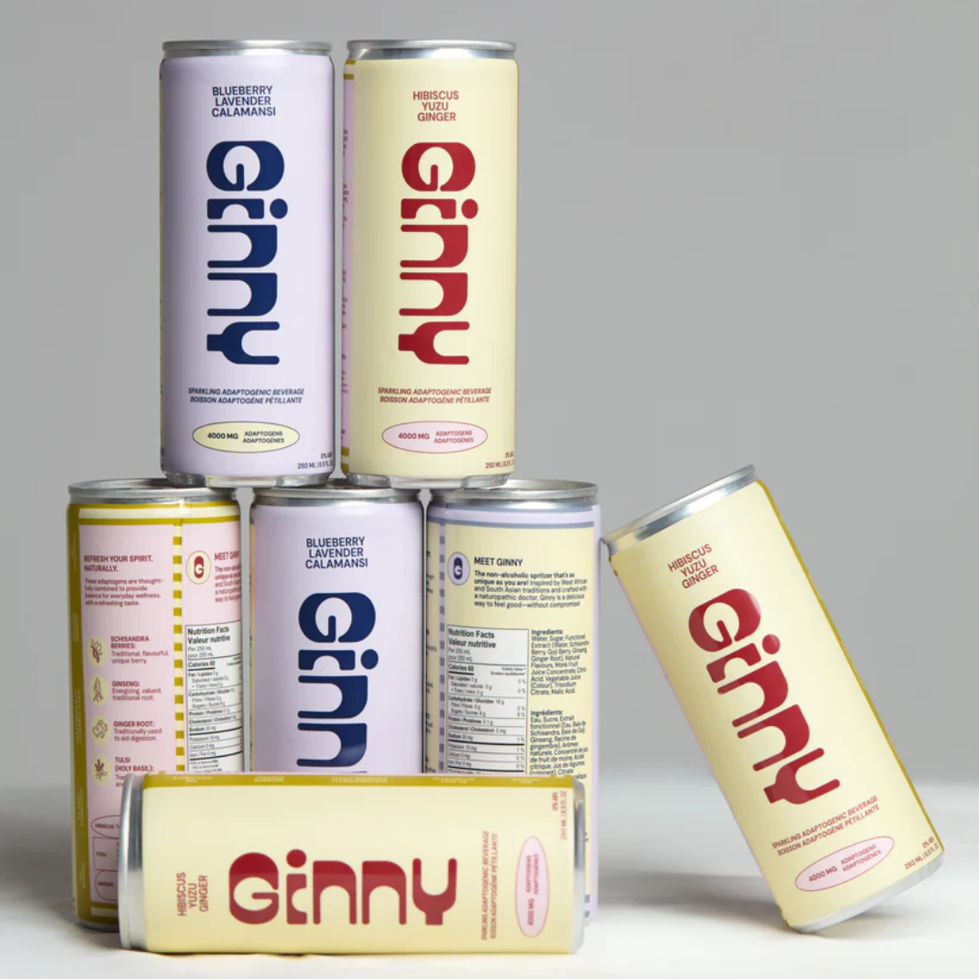 Slim yellow and purple cans stacked on top of each other.