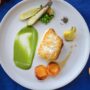Grilled Halibut and Apricot on a white plate