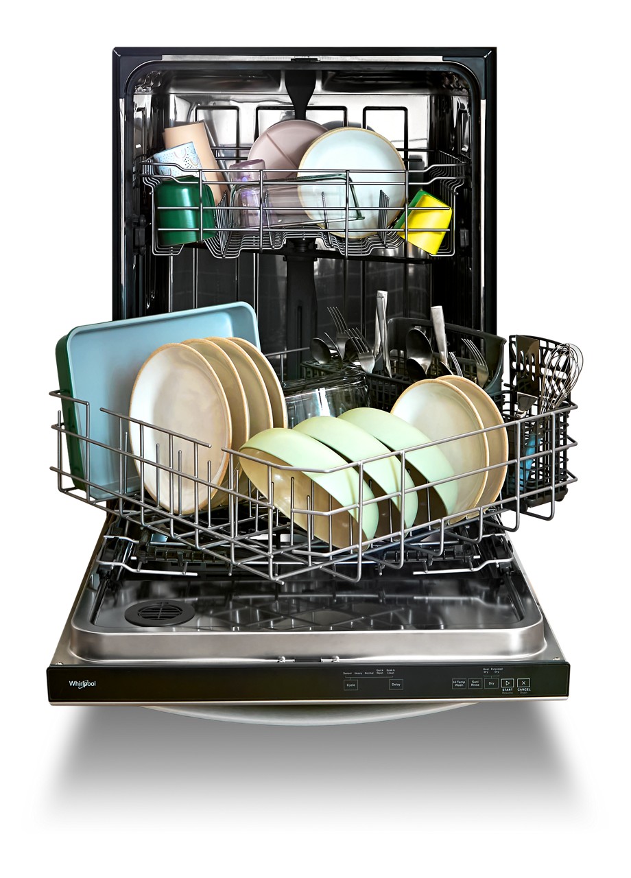 open dishwasher with colourful dishes inside