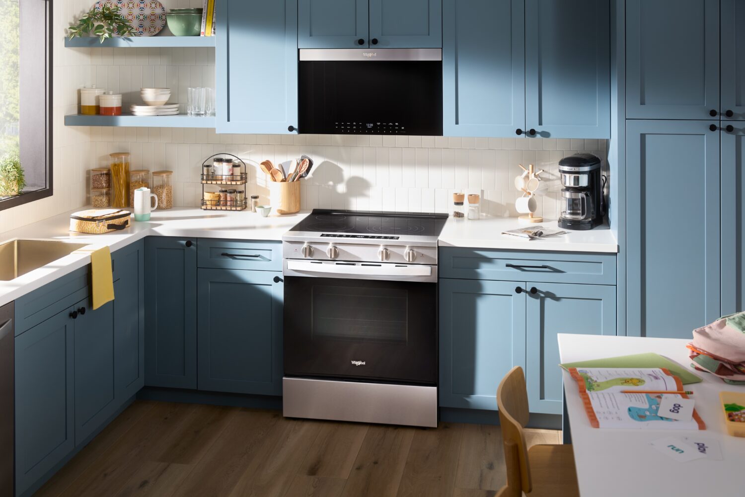 Blue kitchen with new Whirlpool appliances