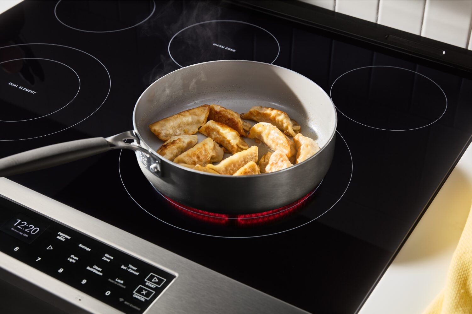 Top of Whirlpool range with gyoza frying